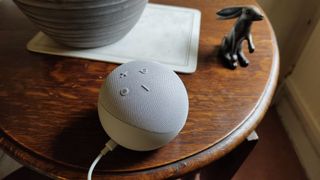 Amazon Echo Dot on a wooden table